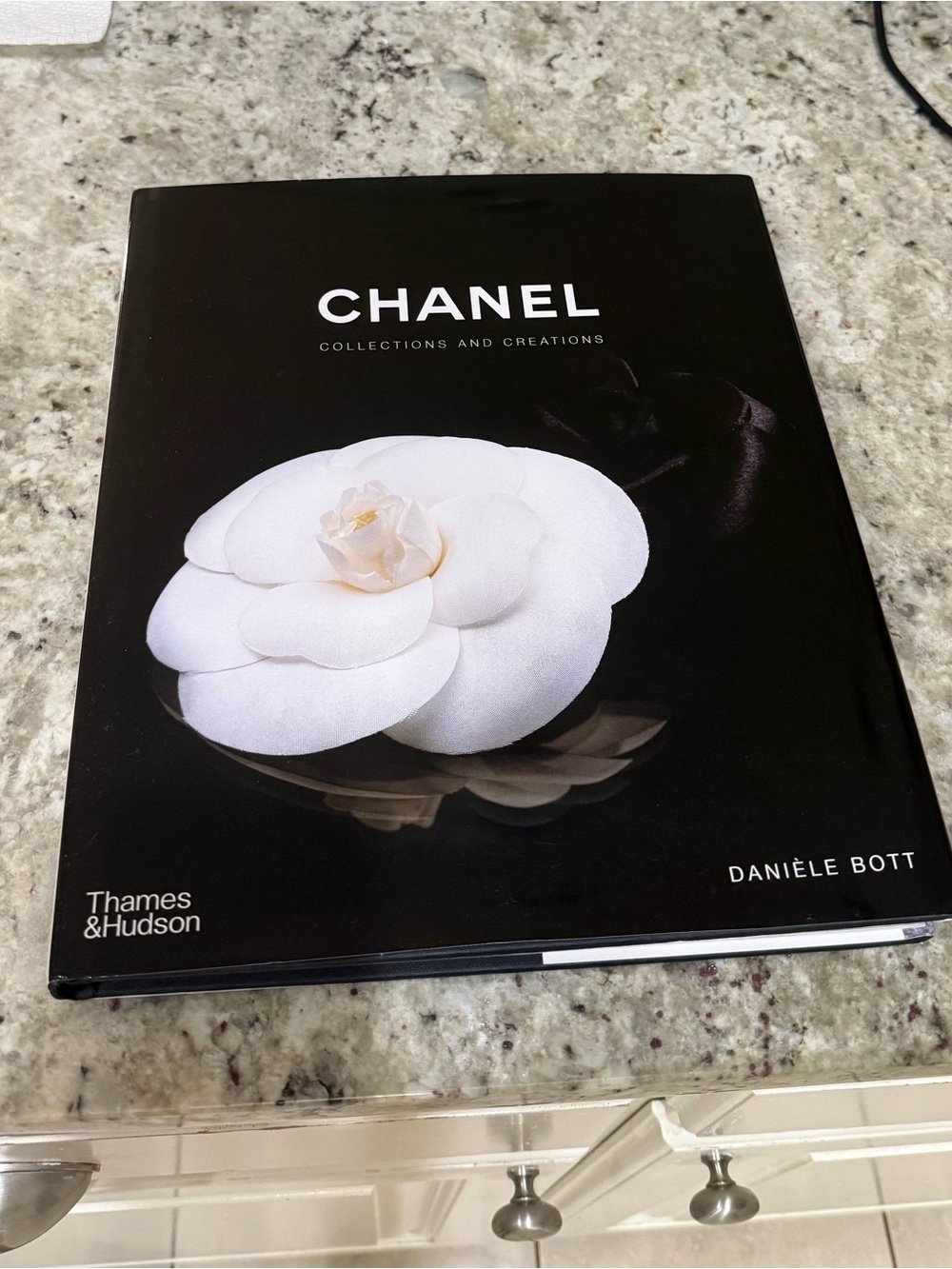 CHANEL Black Coffee Table Book with White Camellia Cover